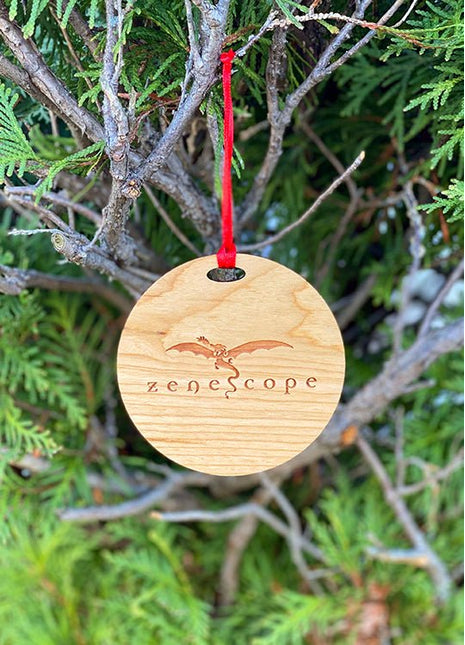 Back of Wooden Ornament. Zenescope Logo. 2022. Zenescope.